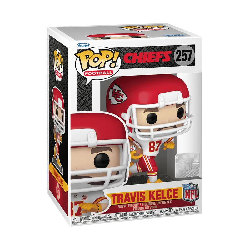 Funko Pop! Football number 257 figure of Travis Kelce, tight end for the Kansas City Chiefs, wearing his white away uniform and holding a football.