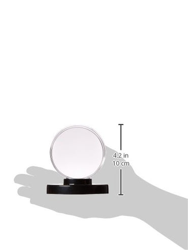 An Ultra Pro hockey puck holder with a sleek black base.