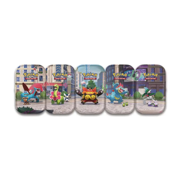 Contents of an individual Lumiose City Mini Tin including two booster packs, a sticker sheet, and a combinable art card.

